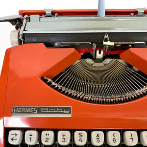Baby Hermes Orange Vintage Typewriter - ShopCurious