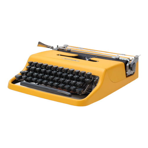 Olivetti Lettera 22 aka Pluma 22 Yellow Working Typewriter - shopcurious