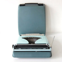 Load image into Gallery viewer, Baby Blue Remington Vintage Streamliner Typewriter - shopcurious
