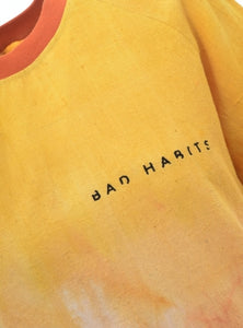 Washed Tie-Dye Logo T-Shirt in Liquid Sunshine by Bad Habits London - ShopCurious