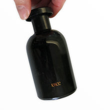 Load image into Gallery viewer, Vintage Biba Black Glass Cologne Bottle - ShopCurious
