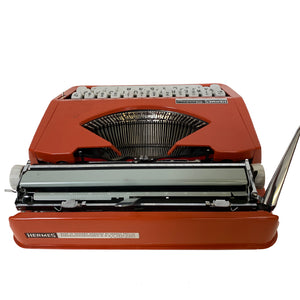 Baby Hermes Orange Vintage Typewriter - ShopCurious