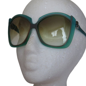 1970s Vintage Aquamarine Silhouette Sunglasses - ShopCurious