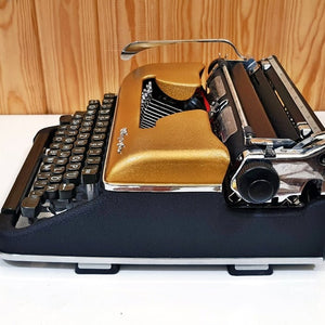 Olympia SM3 Gold Vintage Typewriter with Case - shopcurious